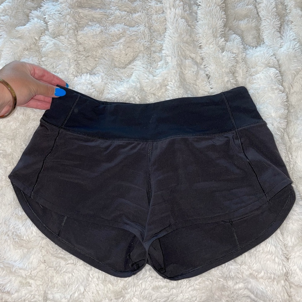 LULULEMON SHORTS. SIZE 2. Worn only twice-just don’t fit anymore. Perf condition